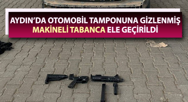 Otomobil tamponuna gizlenmiş, makineli tabanca ele geçirildi