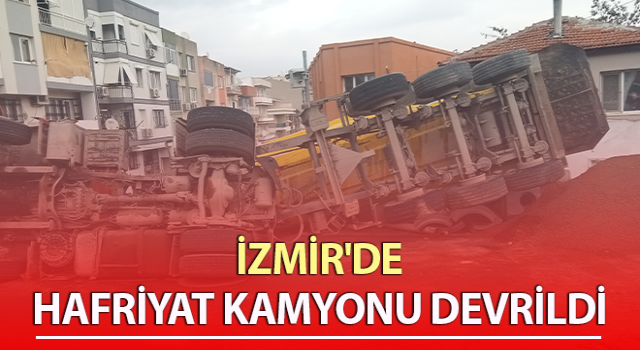 Hafriyat kamyonu yük boşalttığı esnada devrildi