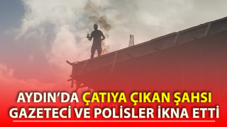 Çatıya çıkan şahsı, gazeteci ve polisler ikna etti