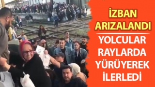 İZBAN arızalandı, yolcular raylarda yürüyerek ilerledi