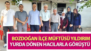 Bozdoğan İlçe Müftüsü Yıldırım, yurda dönen hacılarla görüştü