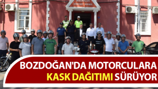 Bozdoğan'da motorculara kask dağıtımı sürüyor