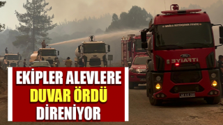 Ekipler alevlere duvar ördü, direniyor