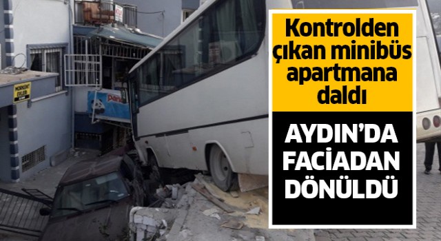 Kontrolden çıkan minibüs apartmana daldı