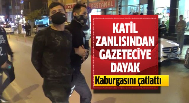 Katil zanlısından gazeteciye dayak!