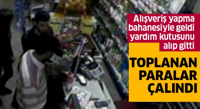 Alışveriş yapma bahanesi ile yardım kutusunu alıp gitti