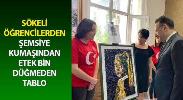 Sökeli öğrencilerden şemsiye kumaşından etek, bin düğmeden tablo