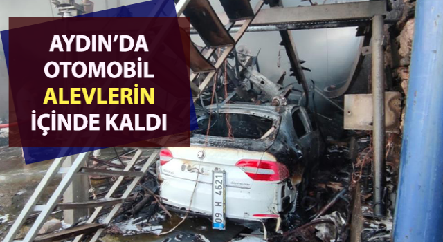 Alevlerin arasında kalan otomobil kullanılamaz hale geldi