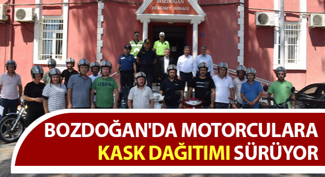 Bozdoğan'da motorculara kask dağıtımı sürüyor