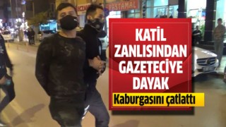 Katil zanlısından gazeteciye dayak!