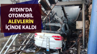 Alevlerin arasında kalan otomobil kullanılamaz hale geldi