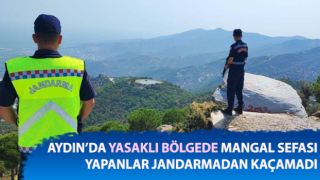 Yasaklı bölgede mangal yapanlar jandarmadan kaçamadı