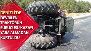 Devrilen traktörün sürücüsü kazayı ucuz atlattı