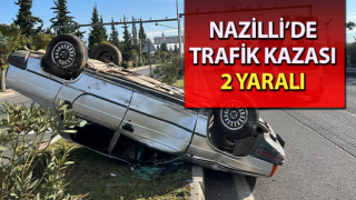 Takla atan otomobildeki iki kişi yaralandı