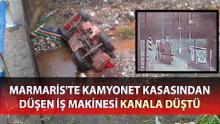 Kamyonette taşınan iş makinesi kanala düştü