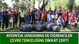 Jandarma ve öğrenciler çevre temizliğine dikkat çekti