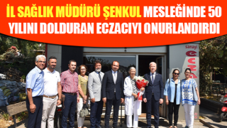 Müdür Şenkul, mesleğinde 50 yılını dolduran eczacıyı onurlandırdı